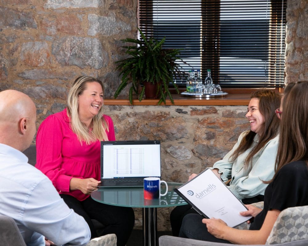 Accounts sat at a desk providing tax advice
