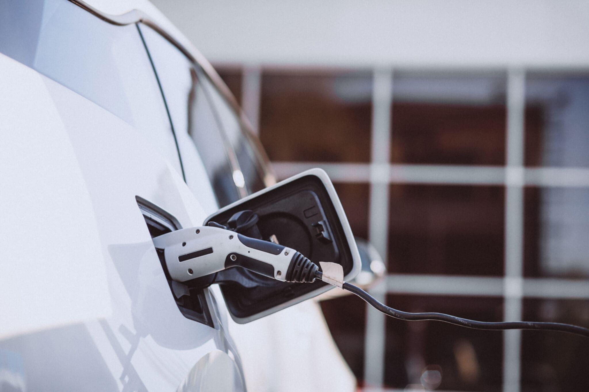 Electric charger plugged into a car