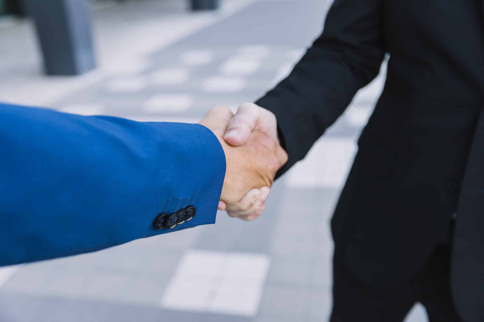 Handshake between two people