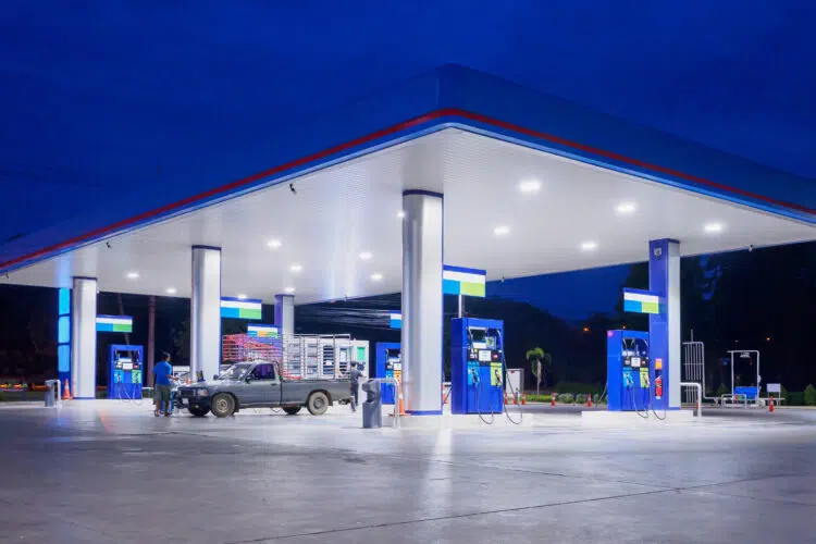 a fuel station at night