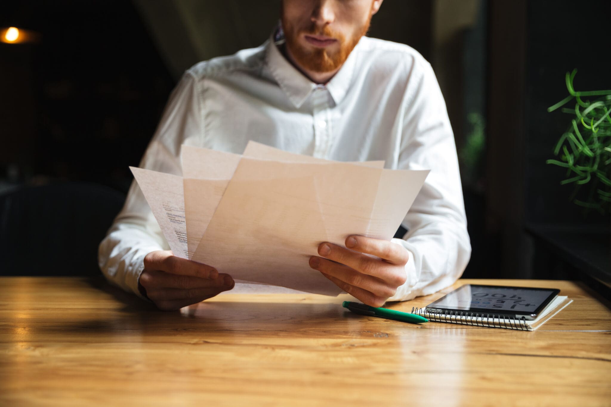 accountant looking at paperwork