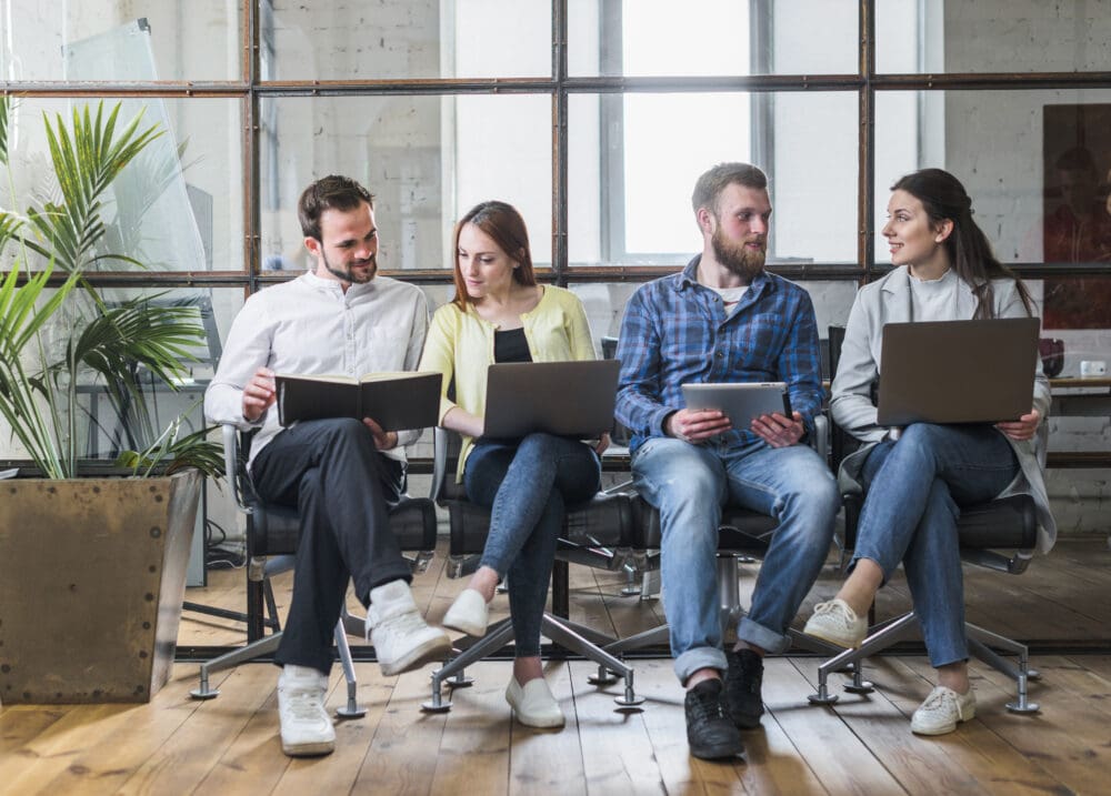 accountants working on laptops
