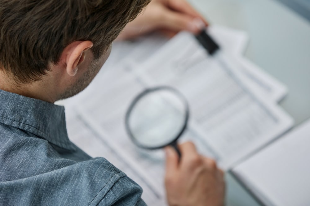a businessman looking through his notes