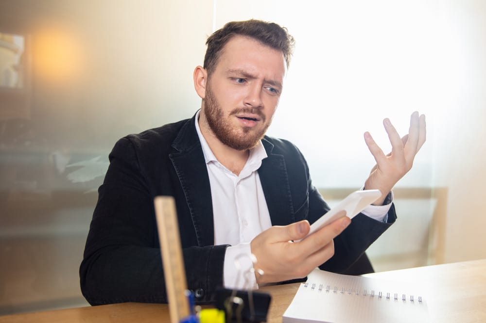 self employmed man checking tax document