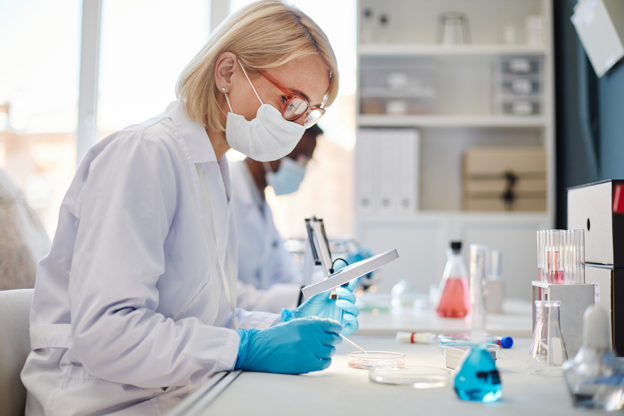 Scientist conducting research in a laboratory eligible for R&D tax relief.