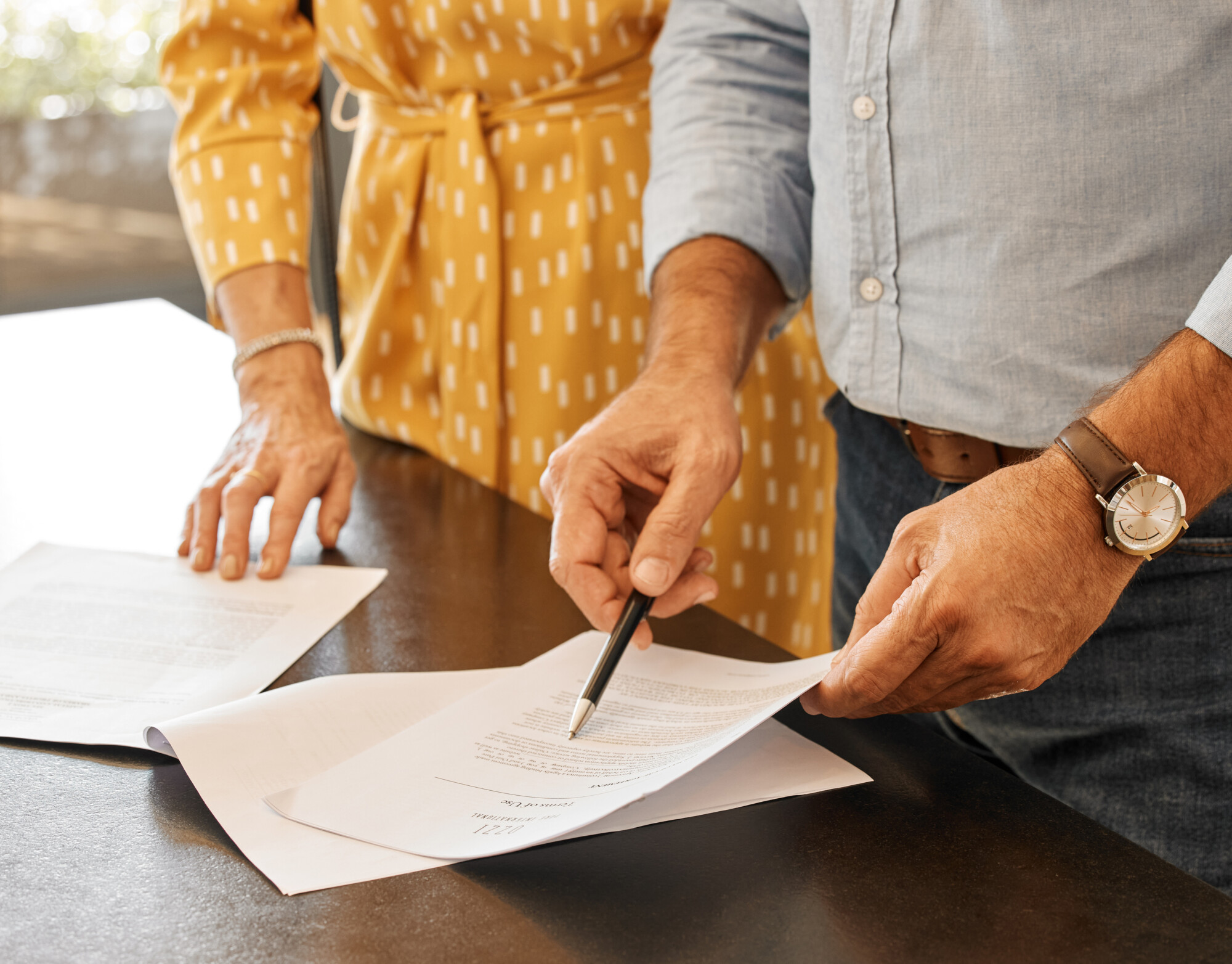 Personal representatives reviewing inheritance tax estate documents.