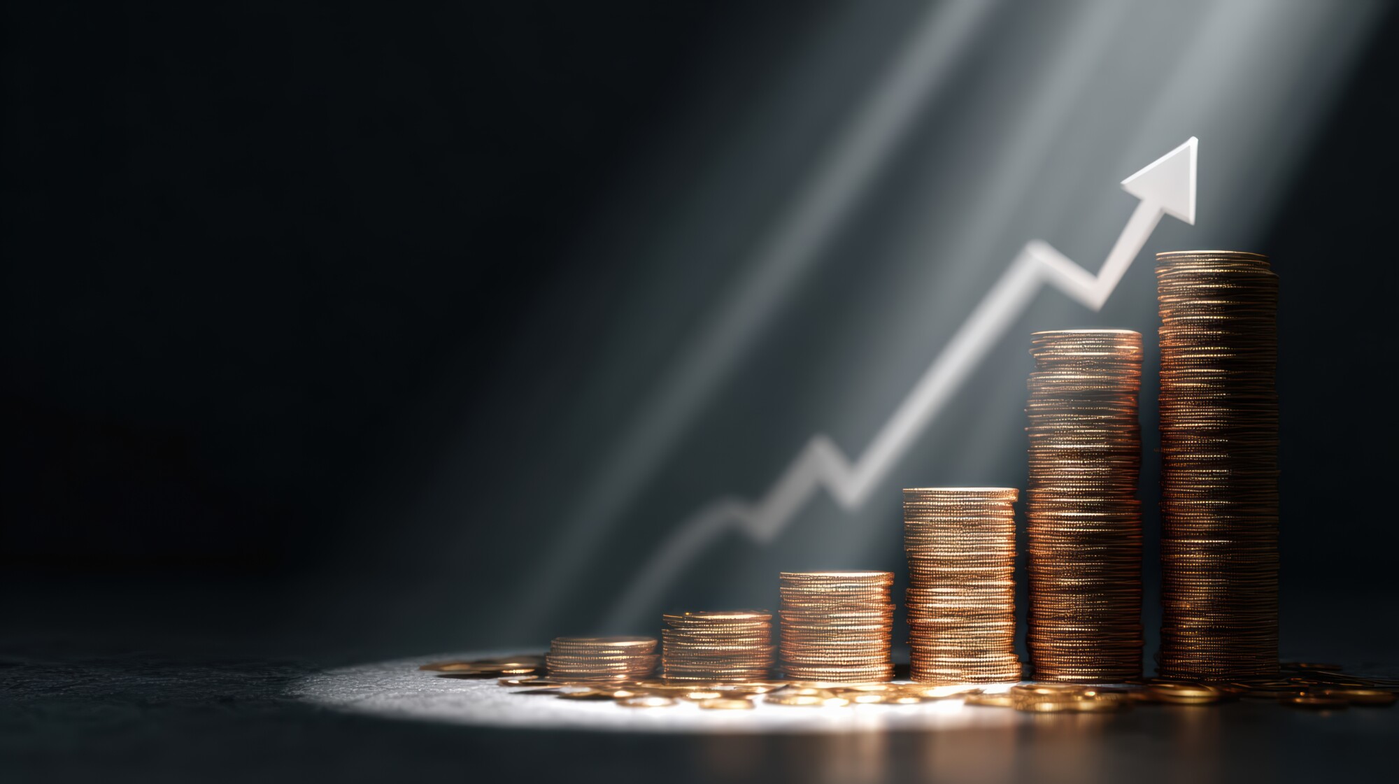 Stacked coins in ascending order with an upward arrow representing financial growth