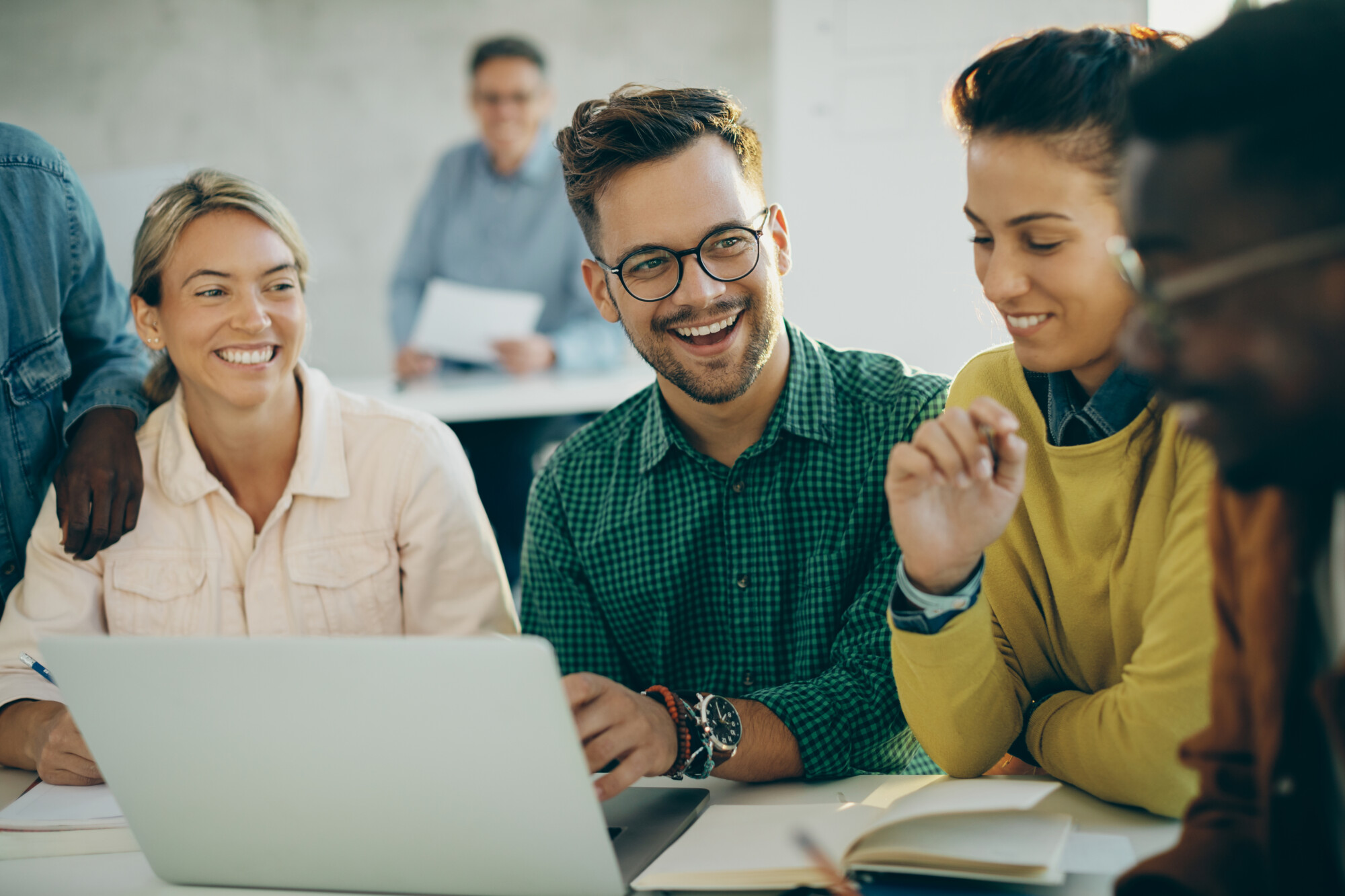Students working together in a higher education classroom